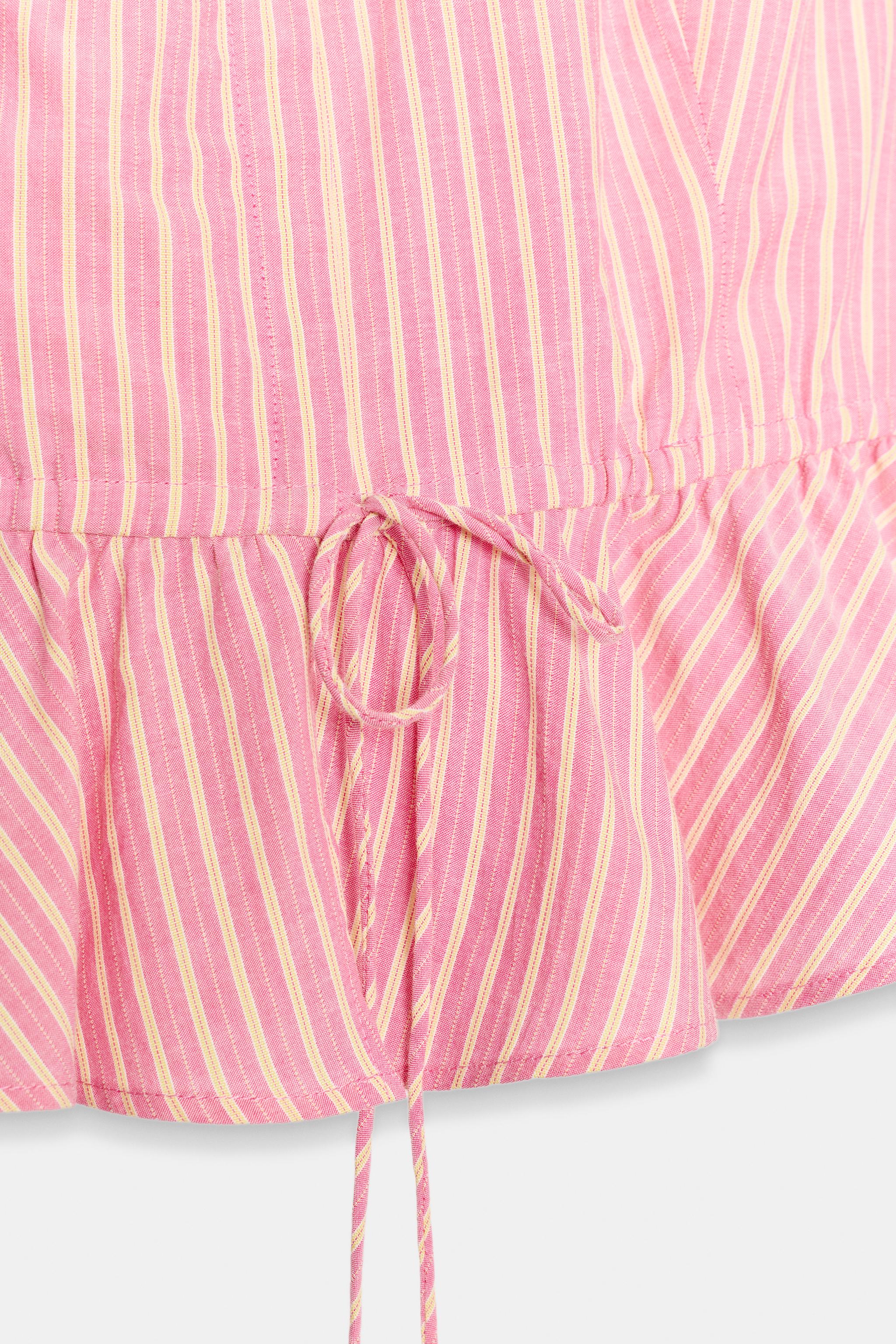 STRIPED PEPLUM TOP